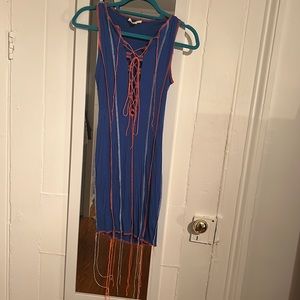 Blue club dress with orange and white accent stitching